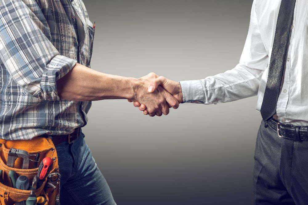 Contractor and Client Shaking Hands